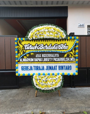 Papan Bunga Duka di Petuk Bukit